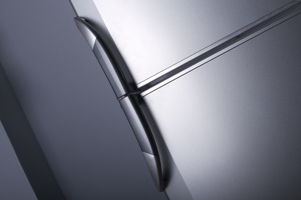 Closeup of stainless steel refrigerator and freezer